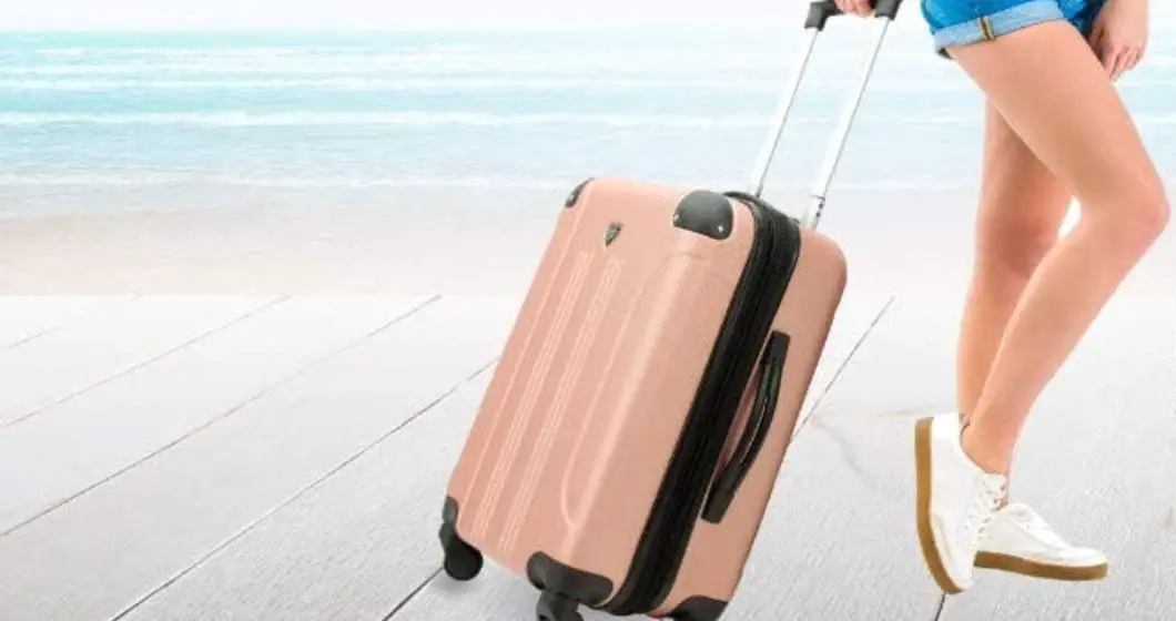 Travelers club luggage rose gold